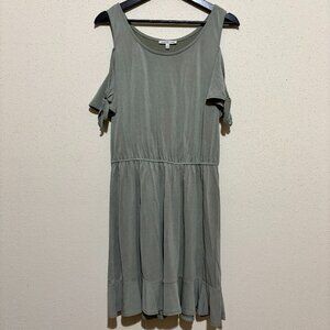 Peep shoulder green dress with ruffle accent on bottom